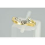 A 9CT GOLD DIAMOND RING, the shaped band set with seven single cut diamonds, 9ct hallmark for