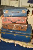 A VINTAGE BLUE TRAVELLING TRUNK together with three other suitcases (4)