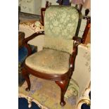 A VICTORIAN MAHOGANY ELBOW CHAIR on cabriole front legs and padded feet