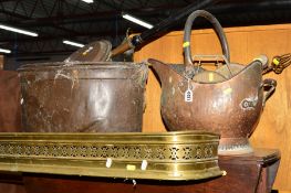 A QUANTITY OF BRASS AND COPPER to include a large copper bucket, four warming pans, fender etc