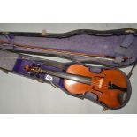 A CASED VIOLIN AND BOW, two piece back, paper label 'Nicolaus Amatus fecit in cremona 16'