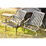A PAIR OF BLACK PAINTED TEAK GARDEN FOLDABLE CHAIRS (2)