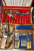 A VICTORIAN WALNUT CASED SET OF BONE HANDLED DESSERT KNIVES AND FORKS, incomplete, together with