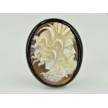 A LATE VICTORIAN JET CAMEO BROOCH, of oval outline, the cameo carved to depict a male god, length