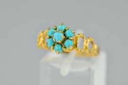 A 9CT GOLD TURQUOISE CLUSTER RING, designed as a tiered cluster of circular turquoise cabochons to