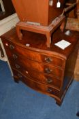 A REPRODUCTION MAHOGANY SERPENTINE CHEST OF FOUR LONG DRAWERS, width 79cm x depth 49cm x height