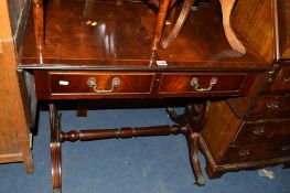 A REPRODUCTION MAHOGANY SOFA TABLE with two drawers