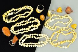 A SELECTION OF NATURAL AMBER JEWELLERY to include an oval natural amber brooch with plain