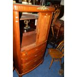 AN OAK DROP LEAF TABLE, three various chairs and a walnut two door cabinet (5)