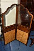 AN EDWARDIAN MAHOGANY DOUBLE FOLD SCREEN with bevelled glass panels and adjustable shelf, width 92cm