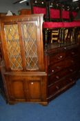A VICTORIAN FLAME MAHOGANY CHEST of two short and three long drawers with turned handles, width