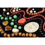 A SELECTION OF MAINLY SEMI PRECIOUS LOOSE GEMS, to include turquoise cabochons, tiger's eye beads,
