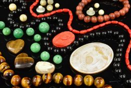 A SELECTION OF MAINLY SEMI PRECIOUS LOOSE GEMS, to include turquoise cabochons, tiger's eye beads,
