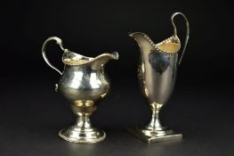 A GEORGE III SILVER HELMET SHAPED PEDESTAL CREAM JUG, crimped rim, engraved initial under lip, on