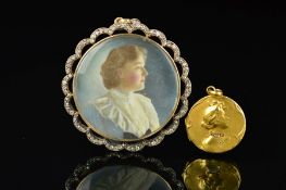 TWO LATE 19TH CENTURY PENDANTS, to include a gold circular diamond portrait pendant, circular design