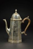 A LATE VICTORIAN SILVER OCTAGONAL COFFEE POT, the domed cover with urn shaped finial, 'S' scroll