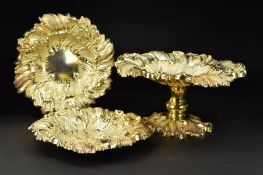 AN EDWARDIAN SILVER GILT THREE PIECE DESSERT SERVICE, foliate chased repousse decoration, comprising