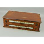 ADVERTISING INTEREST, a Victorian walnut and ebonised counter top chest of two drawers, each