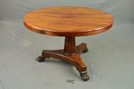 AN EARLY VICTORIAN ROSEWOOD CENTRE TABLE, the circular tilt top with moulded edge, on an octagonal