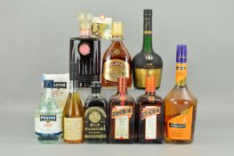 A COLLECTION OF NINE BOTTLES OF SPIRITS, comprising a bottle of Courvoisier VSOP, a bottle of