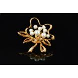 A MID TO LATE 20TH CENTURY MIKIMOTO CULTURED PEARL BROOCH, foliate scroll form, measuring 3.95mm