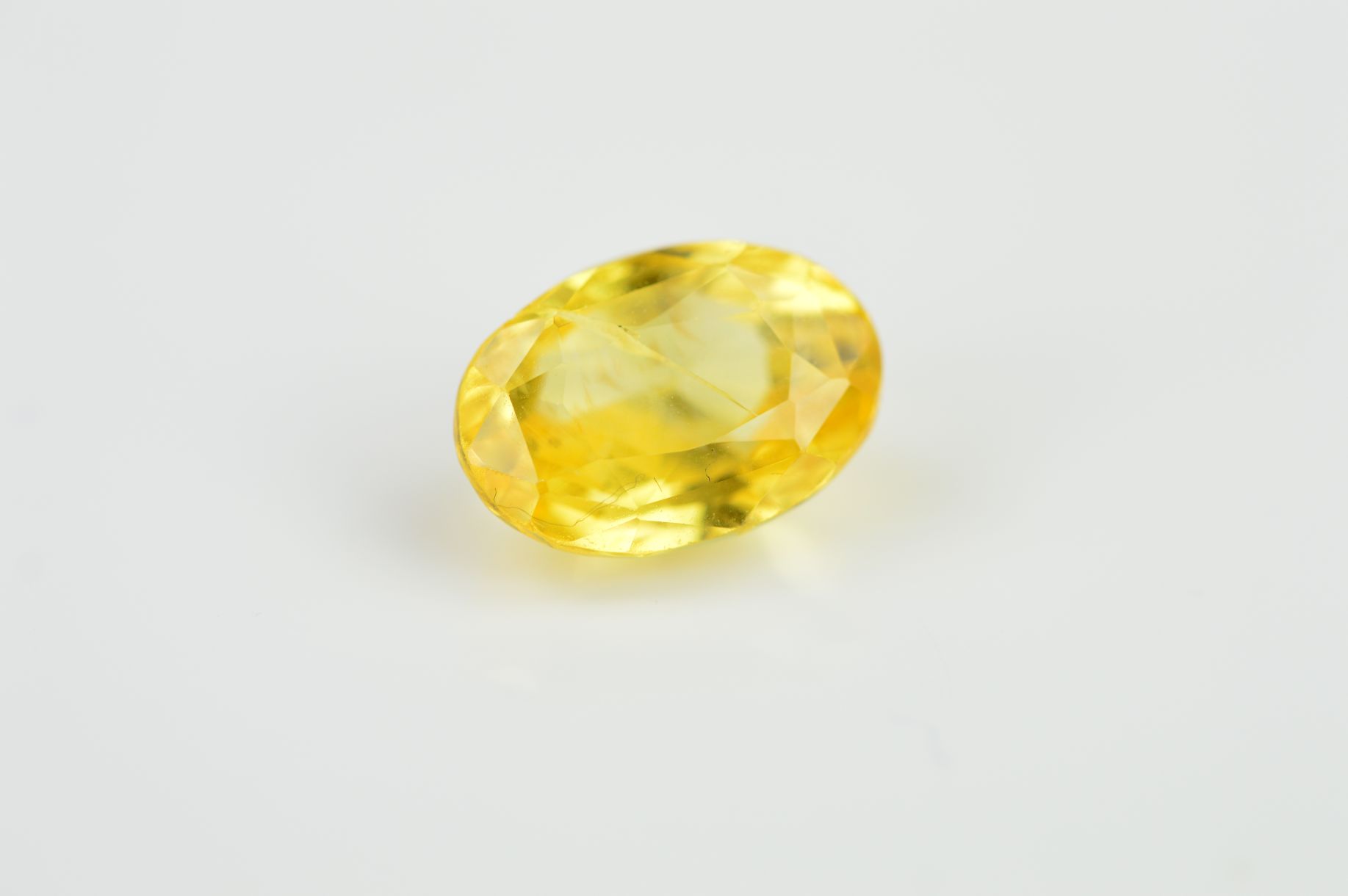 TWO OVAL MIXED CUT YELLOW SAPPHIRES, measuring approximately 12.0mm x 8.5mm, total weight 10.91ct ( - Image 4 of 4