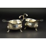 A PAIR OF GEORGE II SILVER SAUCEBOATS, wavy rims, 'S' scroll handles, on three cabriole legs with