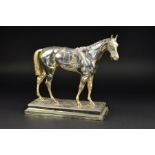 A WMF SILVER PLATED MODEL OF A HORSE, cast as standing on foliage, lacks some parts of tack, the