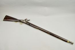 AN ANTIQUE 12 BORE 33 3/4'' BARREL FLINTLOCK MUSKET, of native manufacture, its lock plate has