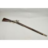 AN ANTIQUE 12 BORE 33 3/4'' BARREL FLINTLOCK MUSKET, of native manufacture, its lock plate has