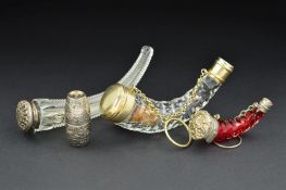 A VICTORIAN CLEAR GLASS FACET CUT SCENT FLASK, of horn form, with gilt metal mounts, chain and