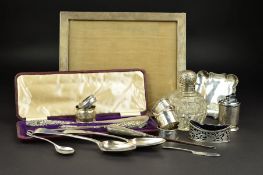 A PARCEL OF SILVER, to include a George V silver mounted rectangular easel back mirror, makers A & J