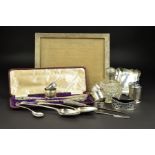 A PARCEL OF SILVER, to include a George V silver mounted rectangular easel back mirror, makers A & J