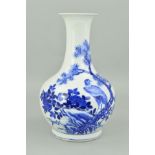 A CHINESE PORCELAIN BLUE AND WHITE BALUSTER VASE, decorated with an eagle perched in the branch of a