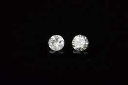 TWO MODERN ROUND BRILLIANT CUT DIAMONDS, first 0.30ct, colour assessed as G-H, clarity I1-1,