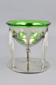 ARCHIBALD KNOX FOR LIBERTY & CO, a Tudric pewter and green glass coupe, the bowl pierced and cast