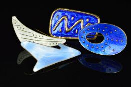 FOUR NORWEGIAN ENAMEL BROOCHES BY OYSTEIN BALLE, the first of oval outline, with star shapes to