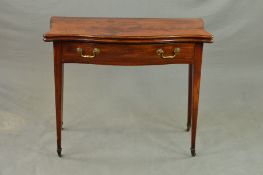 A GEORGE III FRUITWOOD AND MAHOGANY SERPENTINE FOLD OVER TEA TABLE, fitted with along frieze