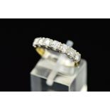 A LATE 20TH CENTURY 18CT GOLD DIAMOND HALF ETERNITY RING, estimated total diamond weight