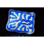 A NORWEGIAN ENAMEL BROOCH BY OYSTEIN BALLE, of shaped rectangular outline with abstract branch-