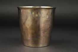 A QUEEN ANNE BRITANNIA STANDARD SILVER BEAKER, of plain conical form, bears punched monogram to