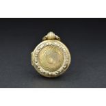 A GEORGE IV SILVER GILT WATCH CASE VINAIGRETTE, engine turned decoration with foliate border in