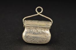 AN EARLY 19TH CENTURY SILVER NOVELTY VINAIGRETTE, in the form of a bag or purse, with hinged twisted