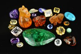 A SELECTION OF MAINLY SEMI PRECIOUS LOOSE GEMS, to include carved amber animals, amethysts, snow