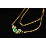 AN EMERALD AND DIAMOND CENTRE PIECE NECKLET, centring on an emerald cut emerald, estimated weight