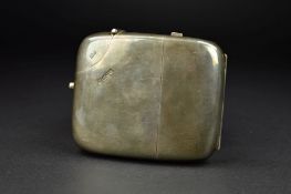 AN EDWARDIAN SILVER RECTANGULAR DOUBLE ENDED HIP FLASK/CIGARETTE CASE, of bowed outline, gilt