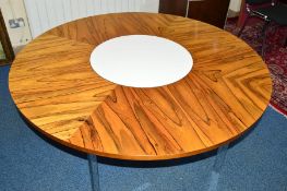RICHARD YOUNG FOR MERROW ASSOCIATES, a rosewood and chrome circular dining table, model 342 R, the