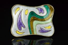 A NORWEGIAN ENAMEL BROOCH BY OYSTEIN BALLE, of shaped rectangular outline, the abstract pattern