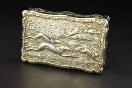 A VICTORIAN SILVER SNUFF BOX, of wavy rectangular outline, the raised relief hinged cover