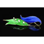 TWO NORWEGIAN DESIGNER ENAMEL BROOCHES, the first a blue enamel leaf brooch by Finn Jensen, the